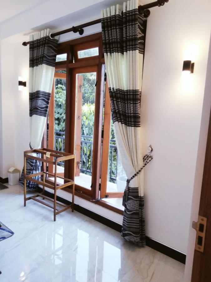 Kelum Homestay Kandy Buitenkant foto