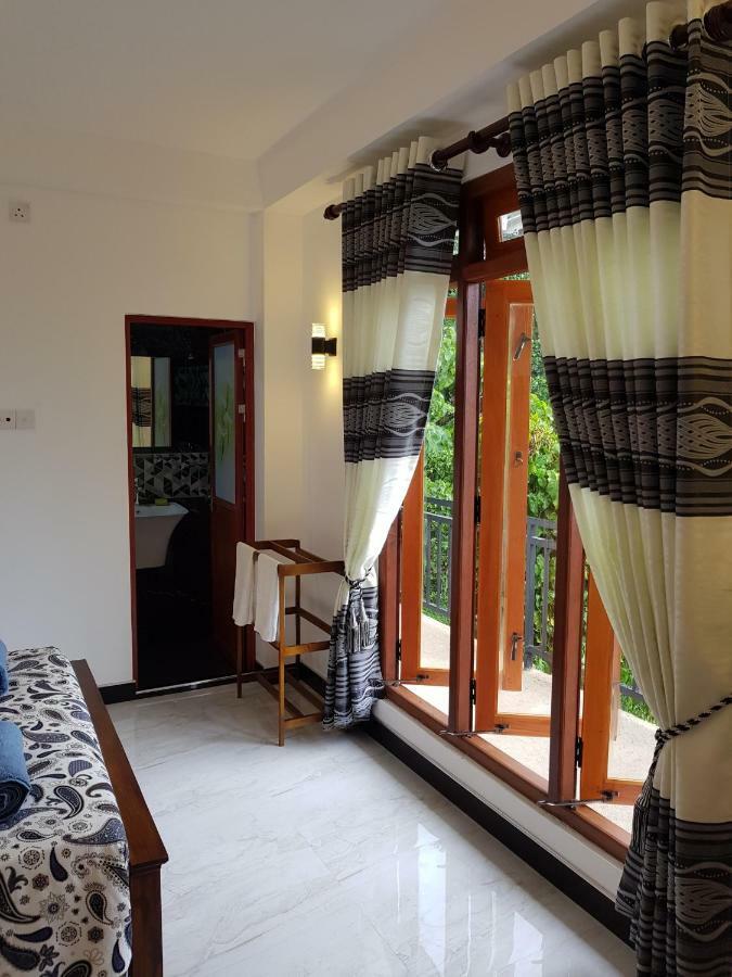 Kelum Homestay Kandy Buitenkant foto