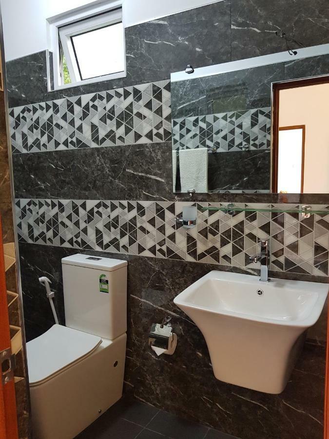 Kelum Homestay Kandy Buitenkant foto