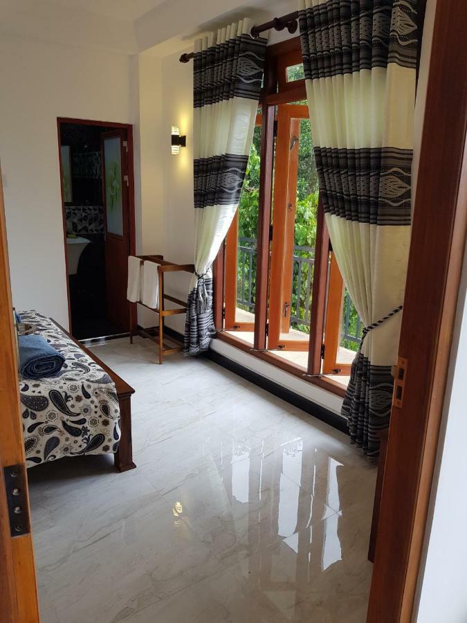 Kelum Homestay Kandy Buitenkant foto