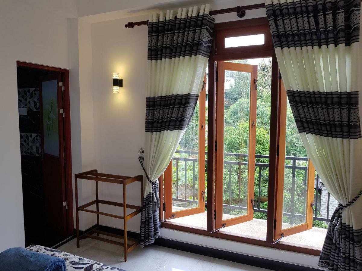 Kelum Homestay Kandy Buitenkant foto